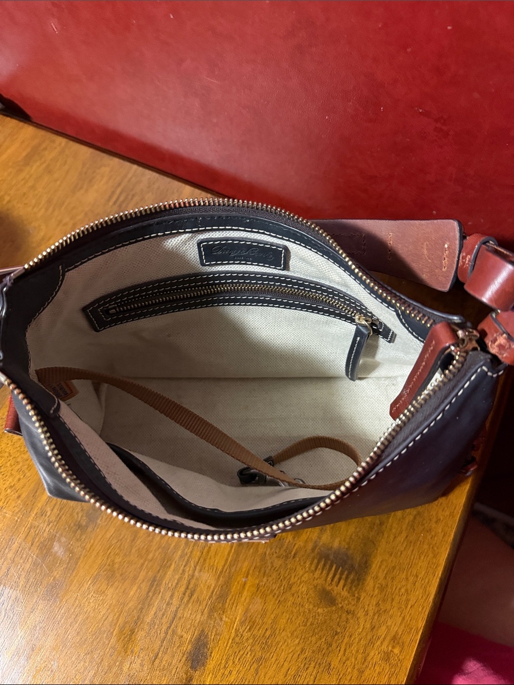 Dooney & Bourke Black Leather Shoulder Bag with Brown Accents - Picture 4 of 5